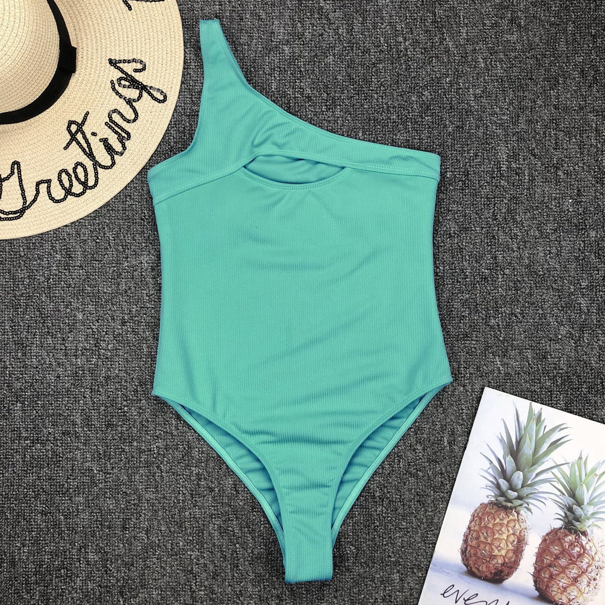 Vintage one-piece ruffled swimwear by The Clothing Company Sydney featuring padded push-up monokini solid swimsuit.