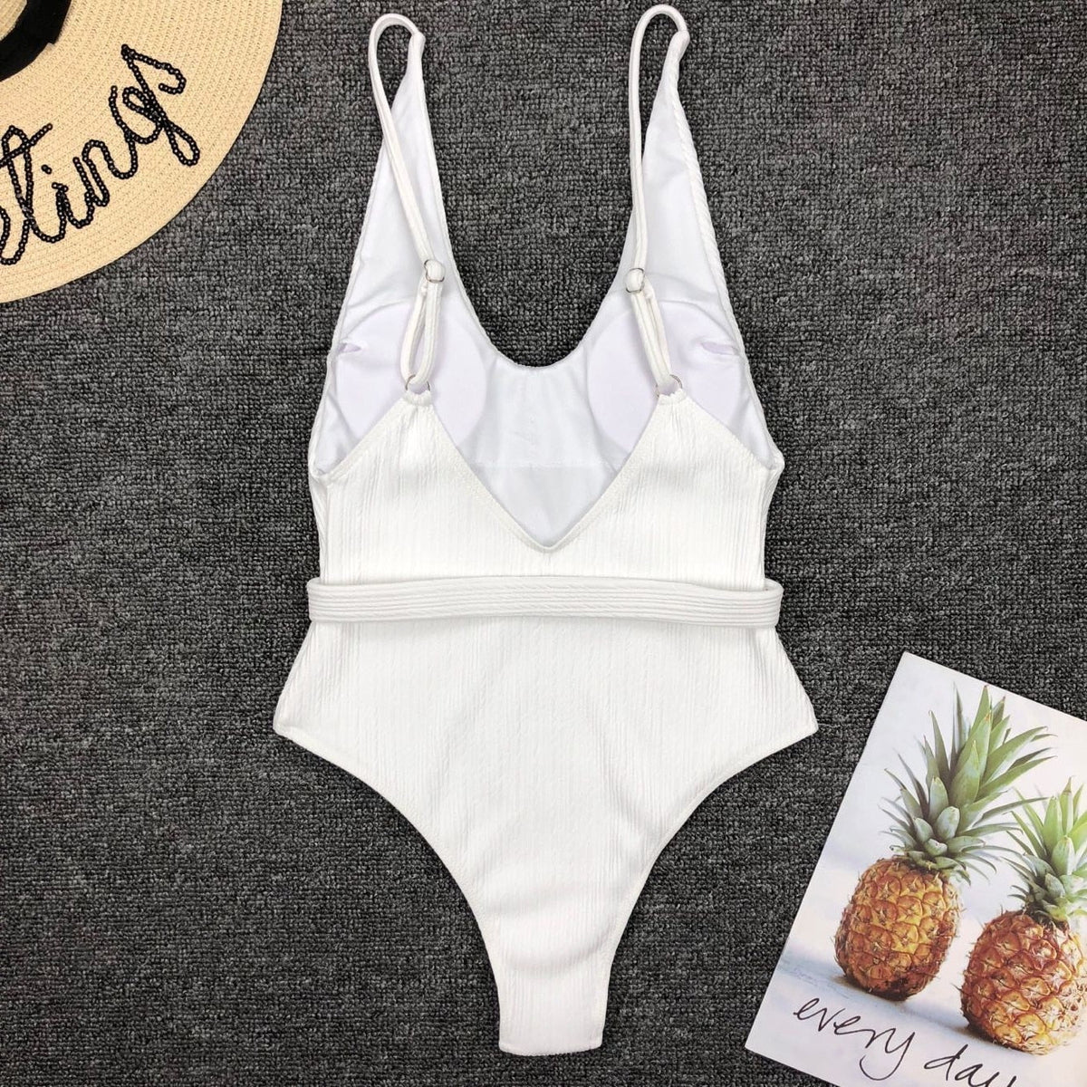 Vintage one-piece ruffled push-up monokini swimsuit by The Clothing Company Sydney with padded support and solid design.