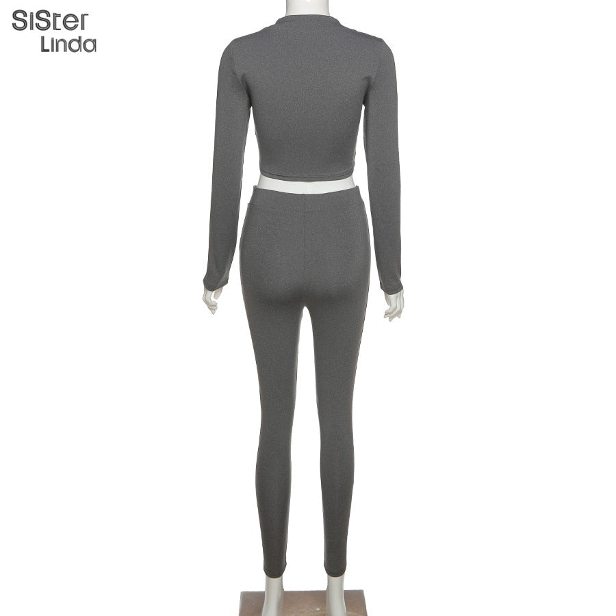 Two-piece sporty activewear set from The Clothing Company Sydney with long sleeve tops and matching leggings for fall workouts.