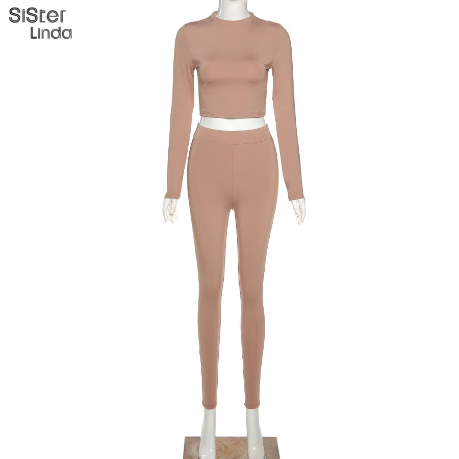 Two-piece sporty activewear set from The Clothing Company Sydney featuring long sleeve tops and leggings for workout and fitness.