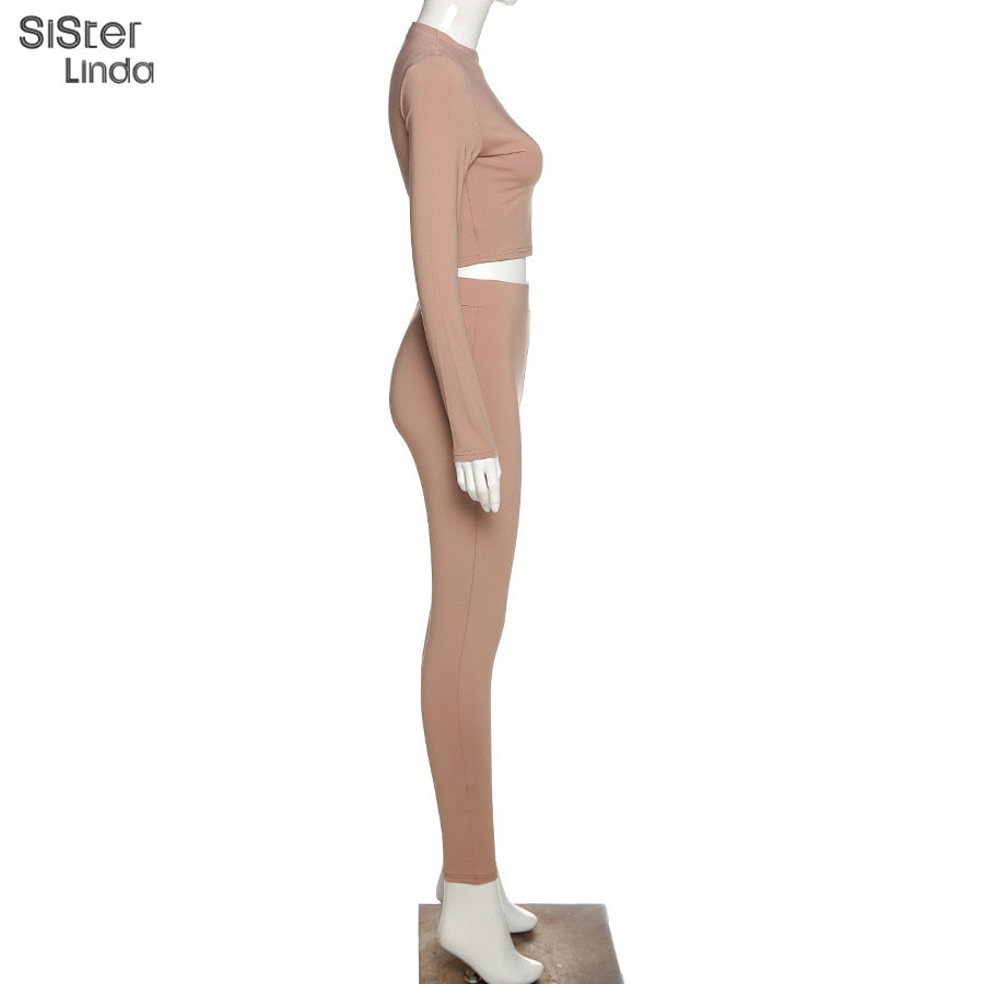 Two-piece sporty activewear set with long sleeve tops and leggings from The Clothing Company Sydney, suitable for fall workouts.
