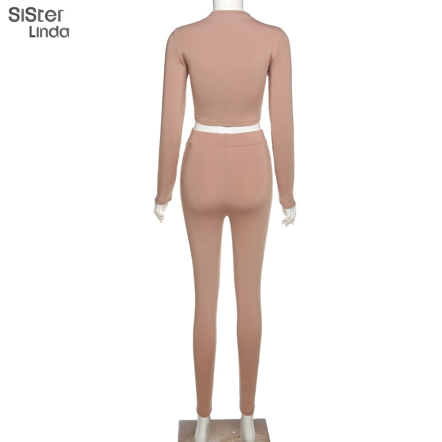 Two-piece sporty activewear set by The Clothing Company Sydney, featuring long sleeve tops and leggings for workout and fall fitness.