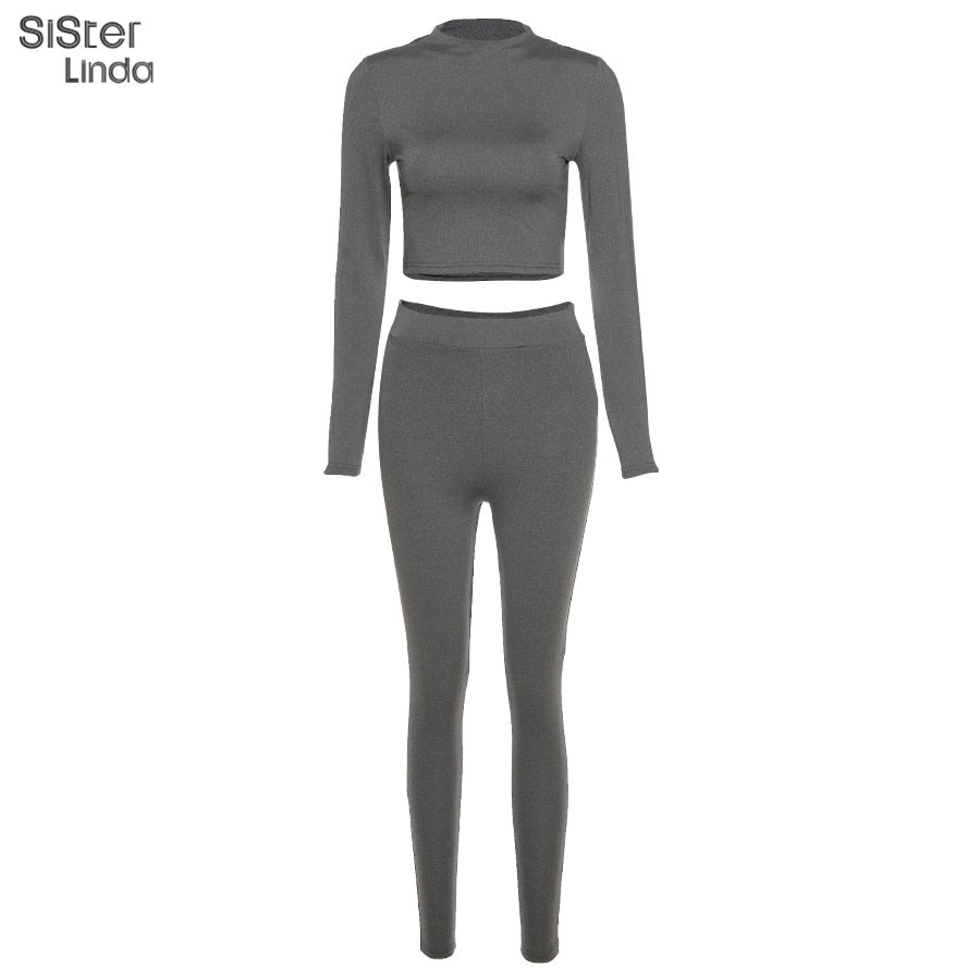 The Clothing Company Sydney two-piece sport activewear set with long sleeve tops and leggings for workout and fitness activities.