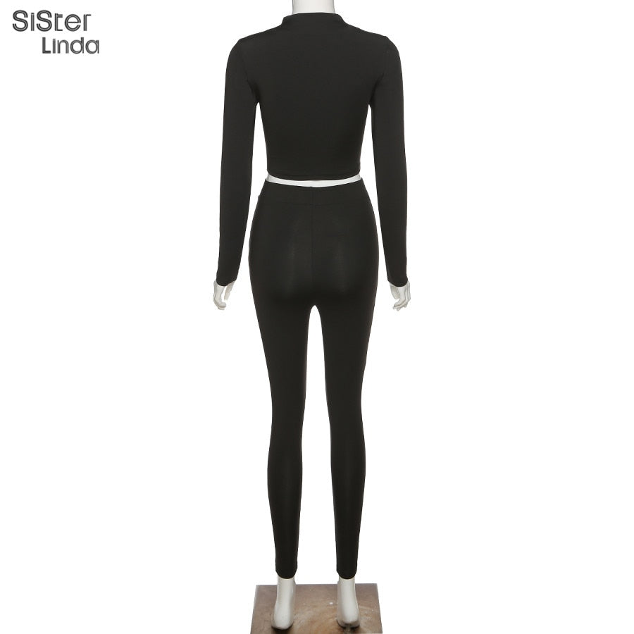 Two-piece sporty activewear set by The Clothing Company Sydney with long sleeve tops and leggings for fall workouts.