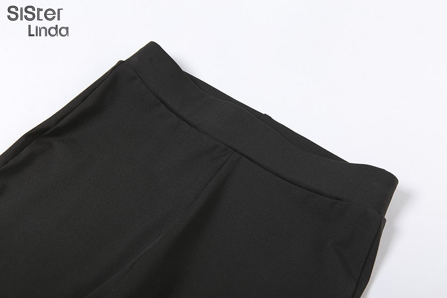 Two-piece sporty activewear set with long sleeve tops and leggings from The Clothing Company Sydney, perfect for fall workouts.