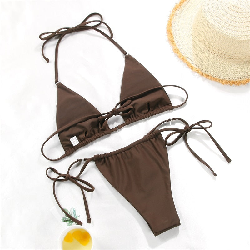 Solid color bikini set with floral print from The Clothing Company Sydney, featuring string bikini style and stylish swimwear design.