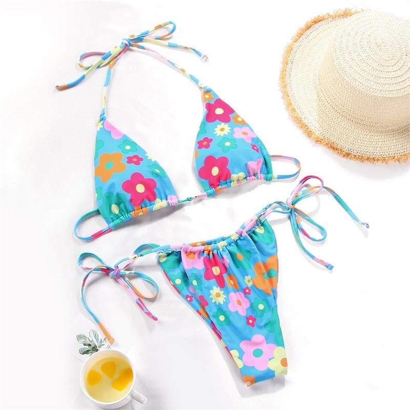 Solid color bikini set by The Clothing Company Sydney featuring floral print, string design, and comfortable swimwear fit.
