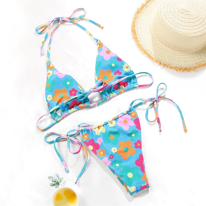 Solid color bikini set with floral print from The Clothing Company Sydney, featuring string swimwear and a stylish bathing suit design.