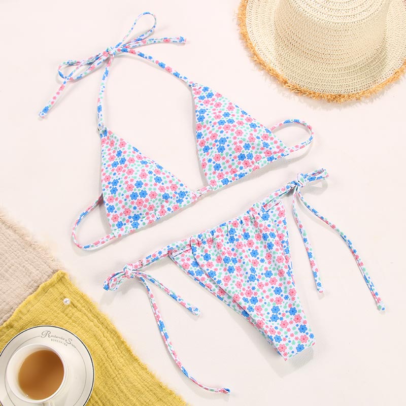 Solid color bikini set with floral print from The Clothing Company Sydney, featuring a string design and swimwear style.