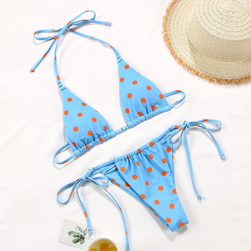 Solid color bikini set with floral print, string design, and comfortable swimwear from The Clothing Company Sydney.