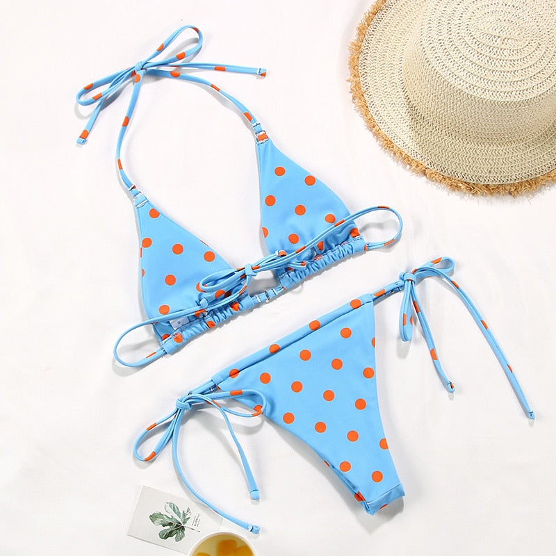 Solid color bikini set with floral print from The Clothing Company Sydney, featuring a string swimsuit design.