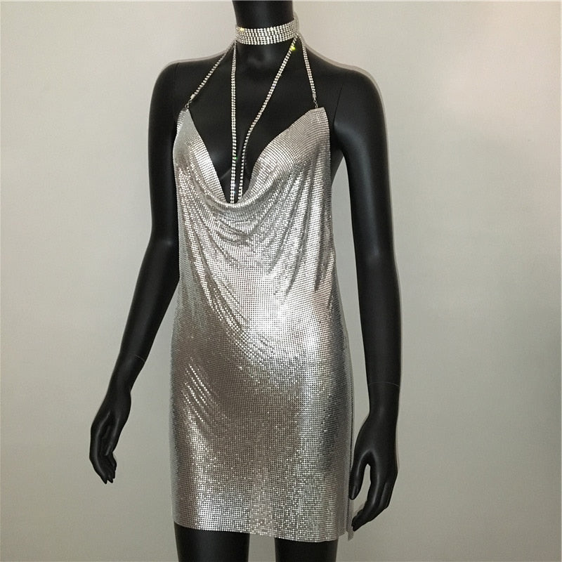 Deep V-neck halter split sequined dress for women with solid backless design and rhinestone chain details, perfect for parties.