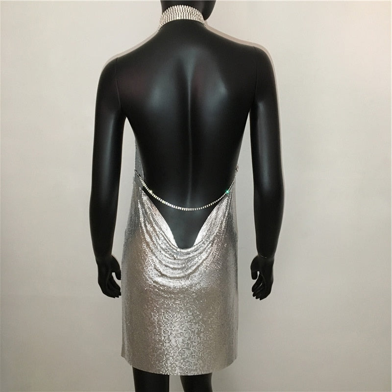 Women’s deep V-neck halter split sequined dress with backless design and rhinestone chain, by The Clothing Company Sydney.