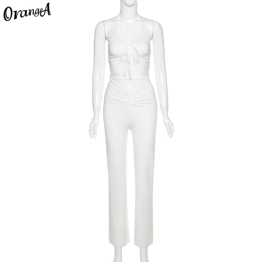 Stretchy black sweatpants from The Clothing Company Sydney, matching 2-piece halter bandage tops and bodycon clubwear set.