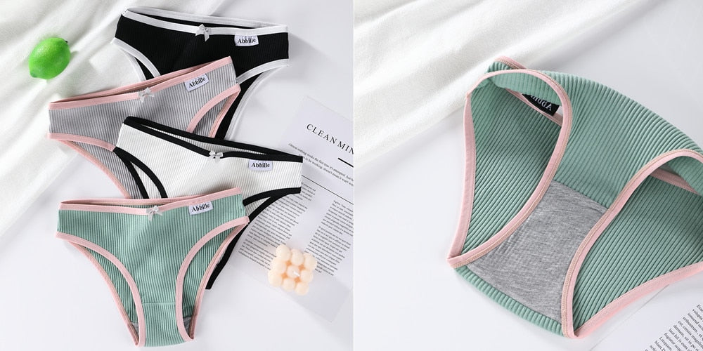 Three-pack of The Clothing Company Sydney thong panties, low-rise G-string underwear with sexy, string design for women.