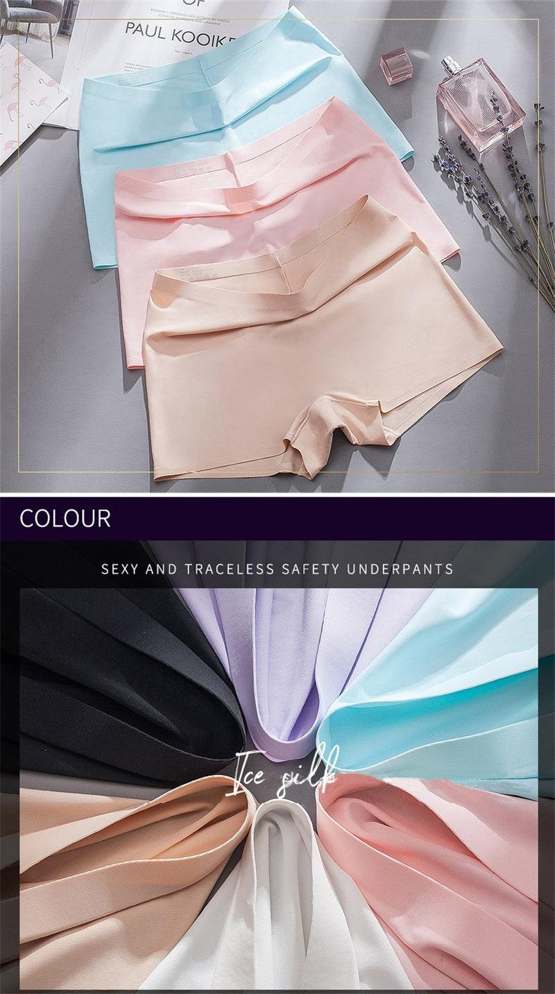 Two-pack women's seamless boxer boyshorts in ice silk fabric with mid-waist design, breathable and comfortable summer underwear.
