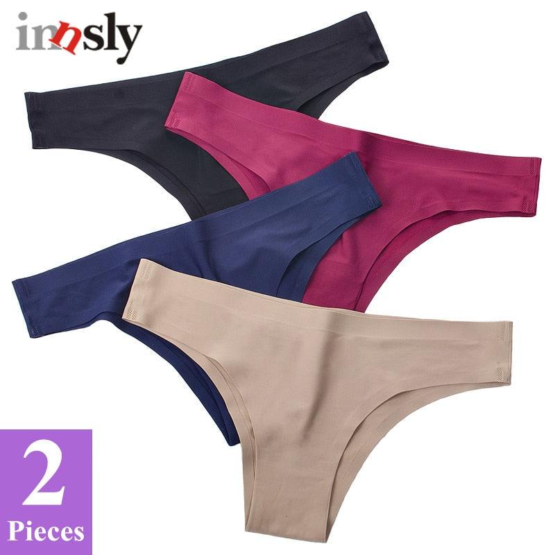 Two seamless, low-rise women's bikini briefs in ice silk fabric, solid T-back design, in plus size from The Clothing Company Sydney.