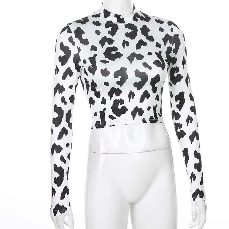 Cow print crop top with long sleeves, slim fit, casual streetwear style from The Clothing Company Sydney