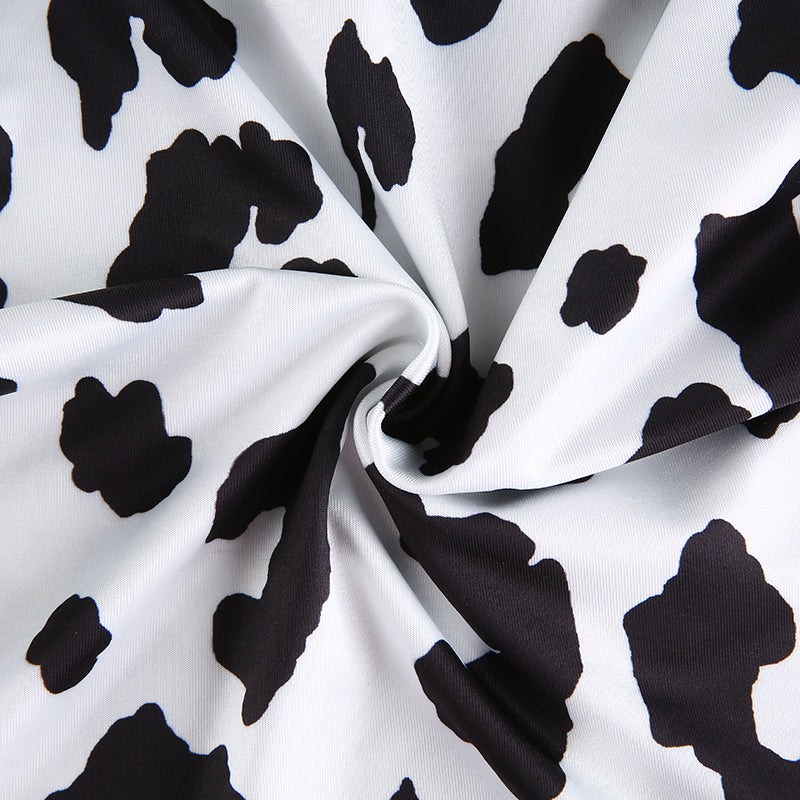 Cow print crop top with long sleeves, slim fit, casual streetwear style from The Clothing Company Sydney.
