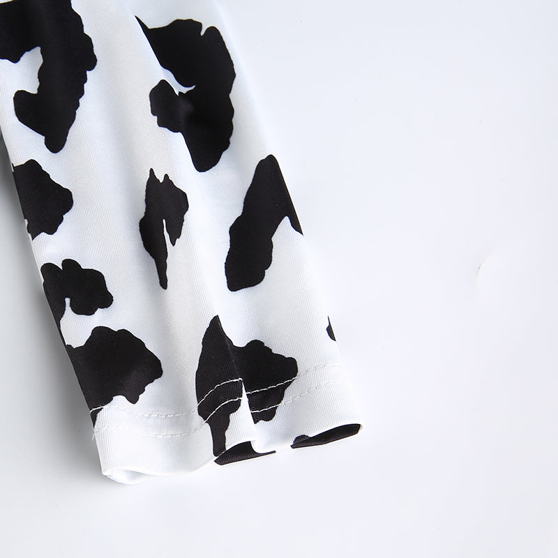 Cow print long sleeve crop top from The Clothing Company Sydney, featuring a slim fit casual streetwear style.