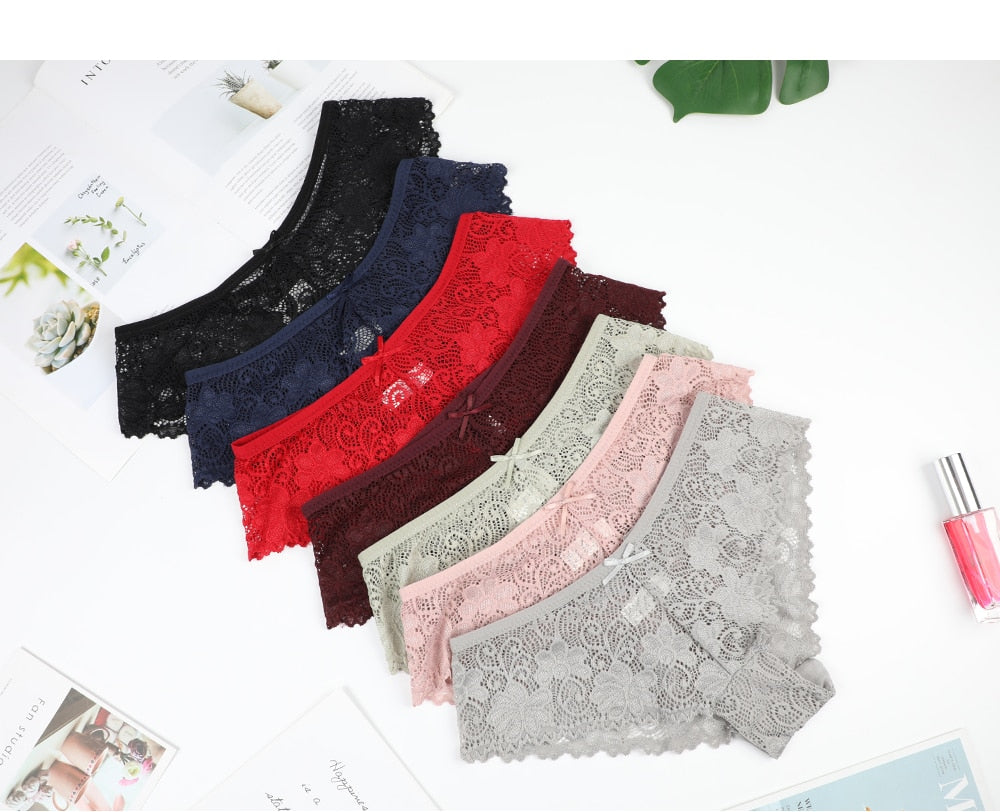 Three-pack of seamless lace thong panties from The Clothing Company Sydney, showing smooth, comfortable lingerie briefs.