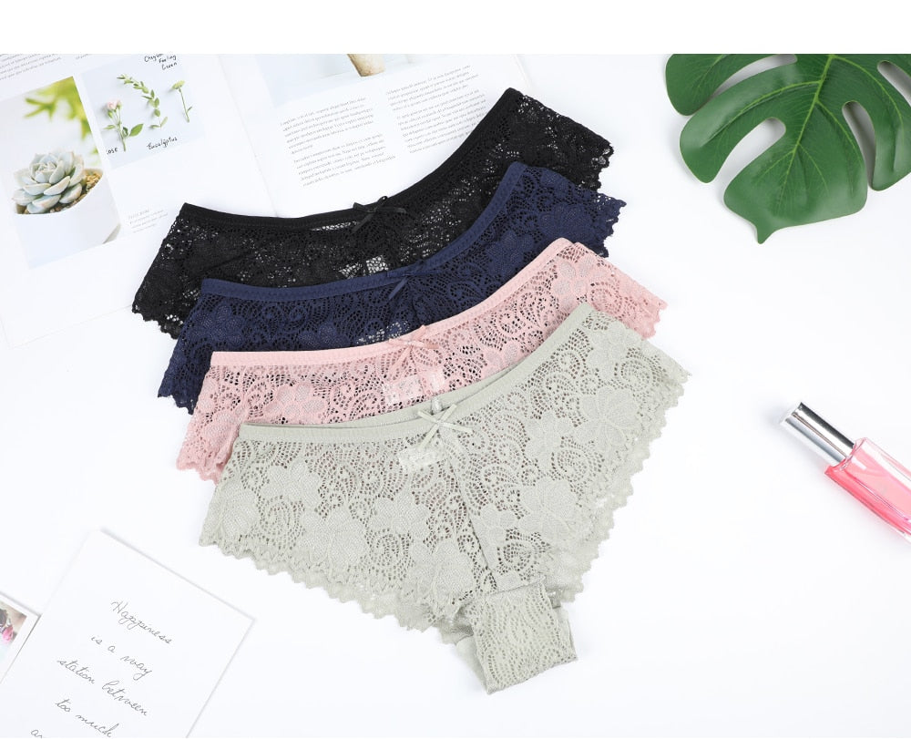 Three-pack of seamless lace thong panties from The Clothing Company Sydney, featuring comfortable, stylish lingerie briefs.