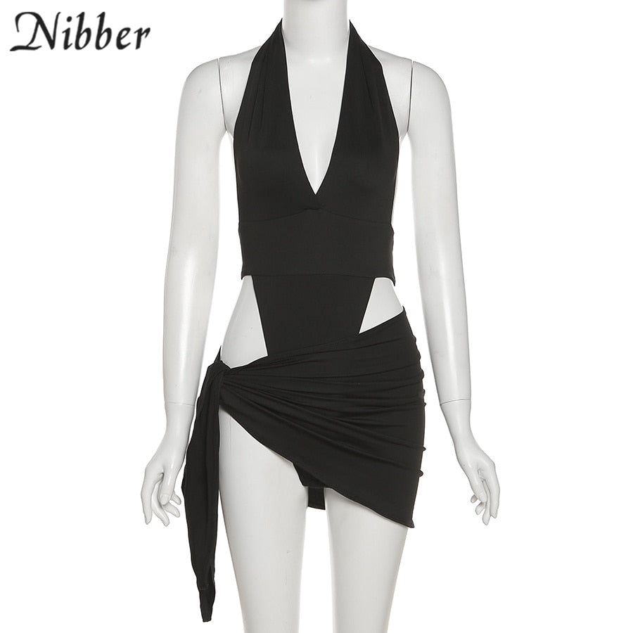 Two-piece beach vacation wear bikini bodysuit and skirt set for women, featuring a stylish dress design in light, summery fabric.