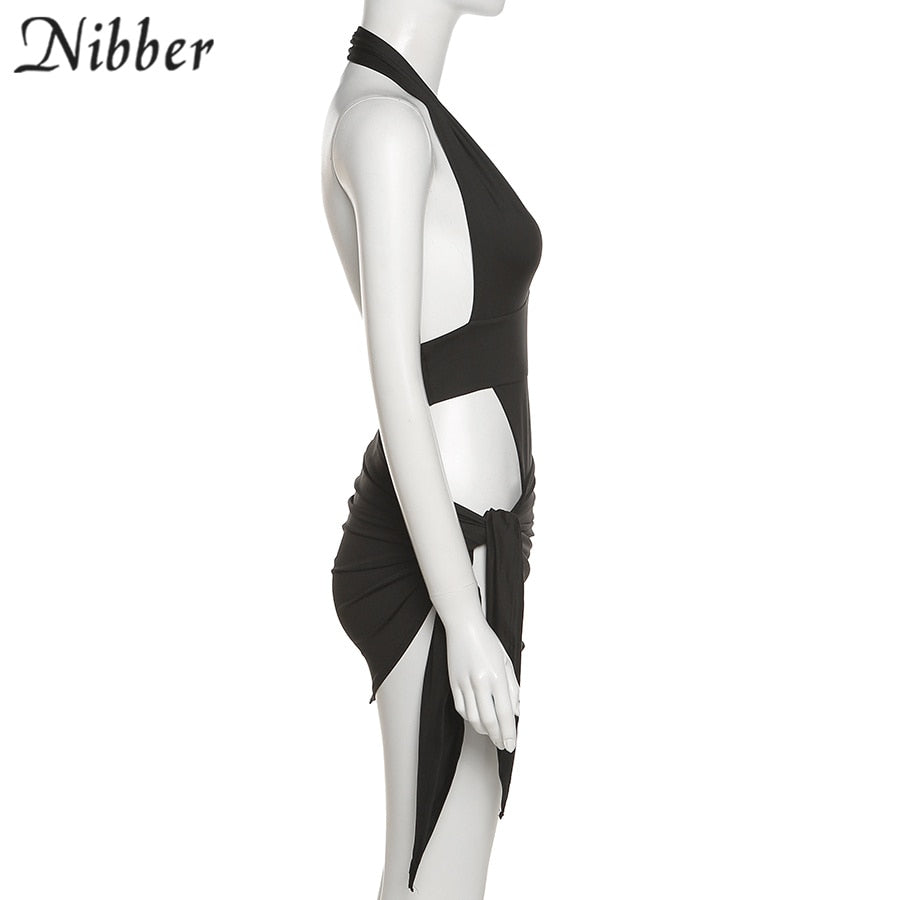 Women's beach vacation wear set featuring a basic bikini bodysuit and skirt from The Clothing Company Sydney.