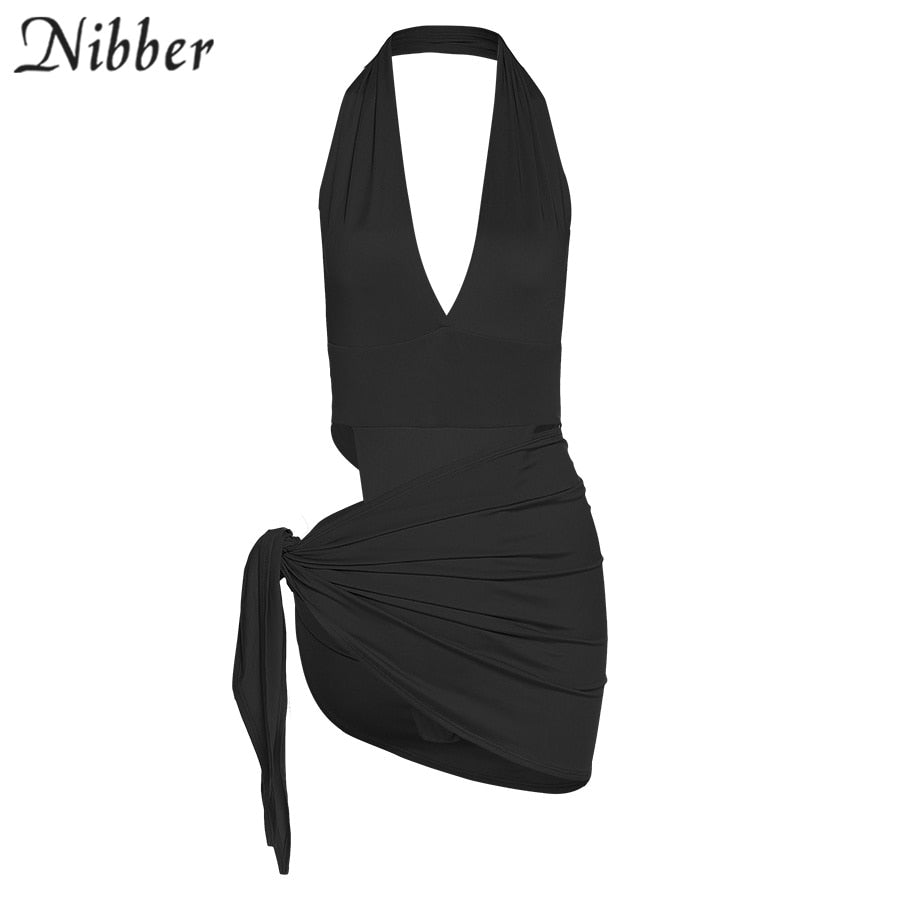 Women's beach vacation wear bikini bodysuit and skirt set by The Clothing Company Sydney, featuring a stylish dress for summer outings.