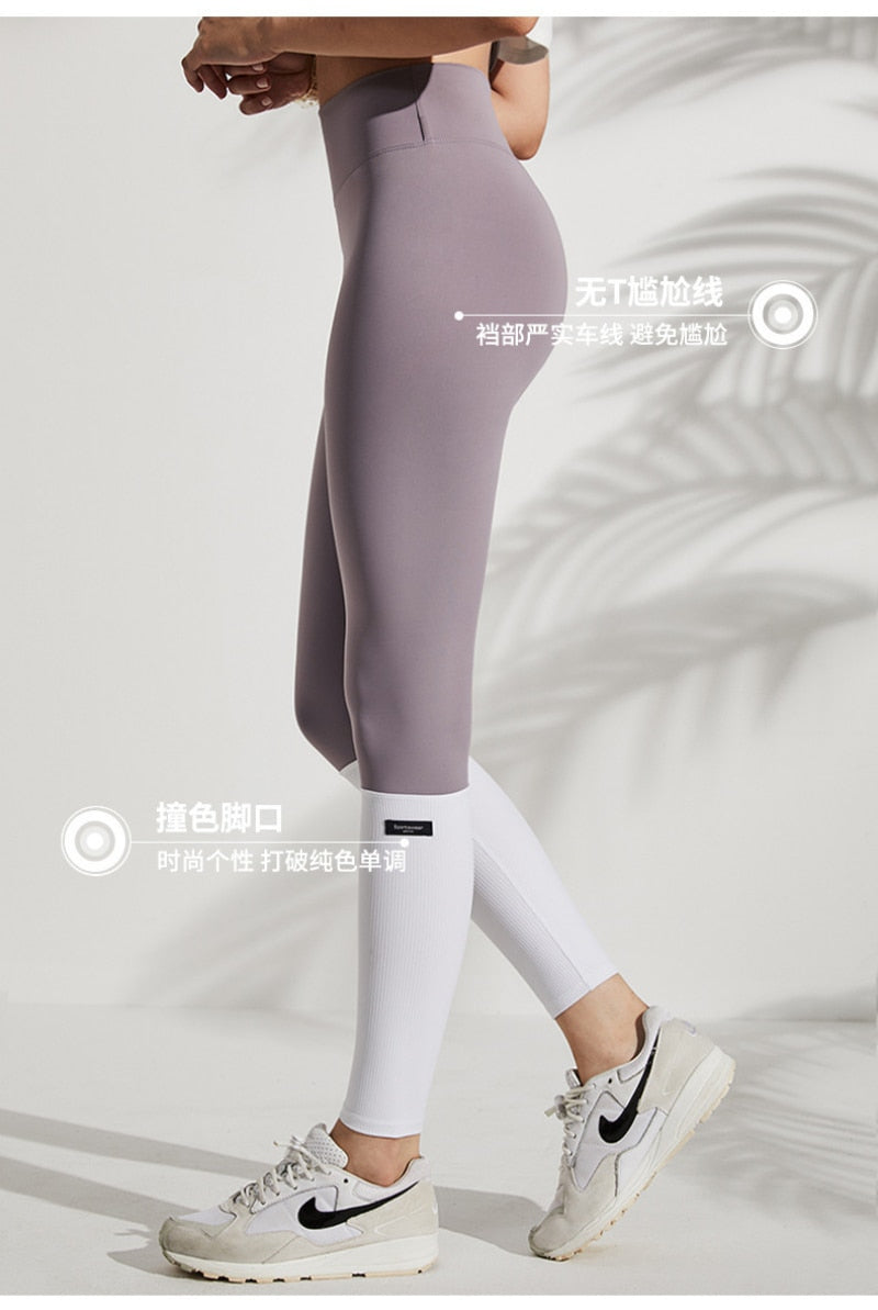 High-waist quick-dry sport leggings from The Clothing Company Sydney, featuring a tight fit and push-up design for workout comfort.