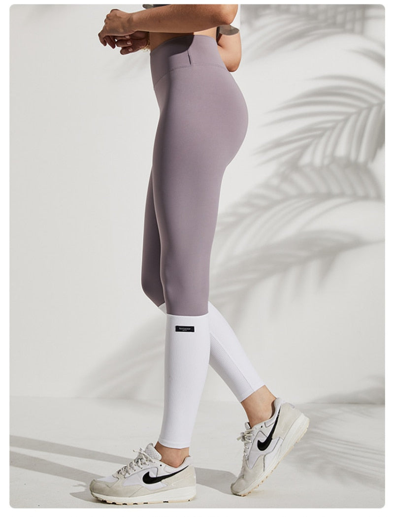 High-waist quick-dry sport leggings by The Clothing Company Sydney, tight yoga pants for workout and fitness activities.