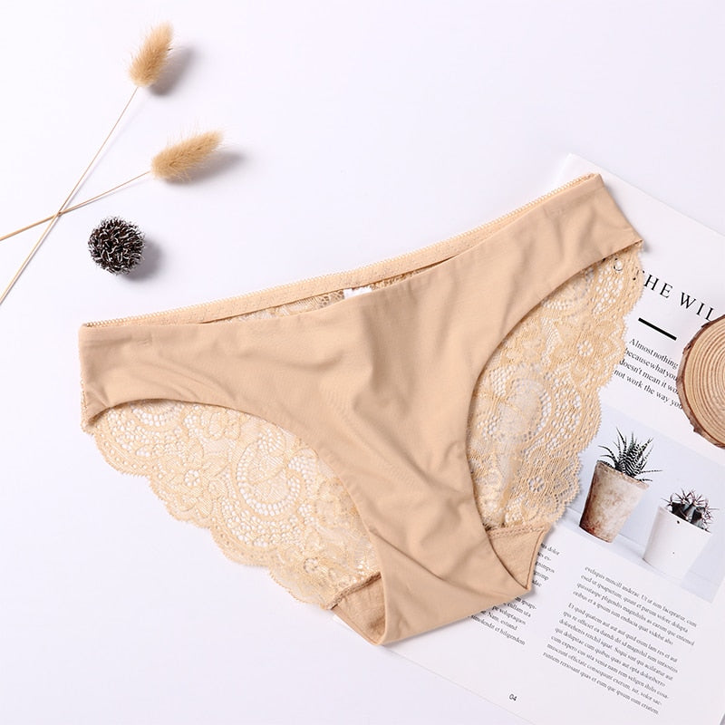 Plus size lace underwear by The Clothing Company Sydney featuring transparent low-rise cotton briefs with delicate lace details.