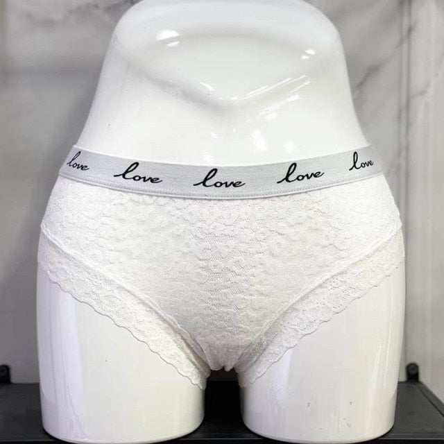 Low-waist lace G-string underwear from The Clothing Company Sydney with transparent fabric and LOVE letter embroidery.