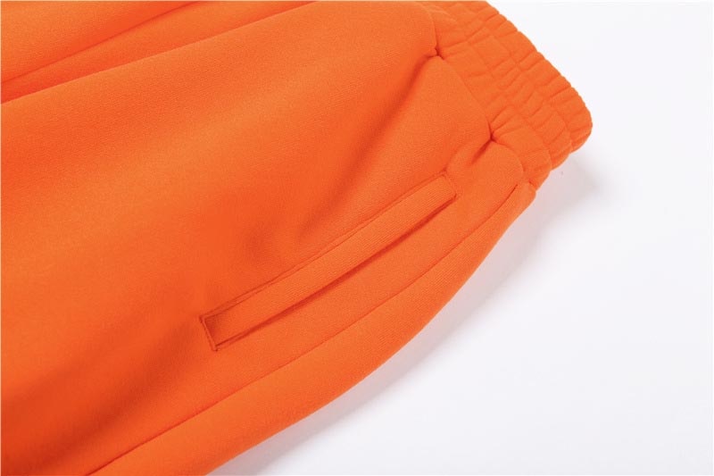 Solid color tracksuit pants from The Clothing Company Sydney, casual long sleeve hoodie and pant set for autumn and winter wear.