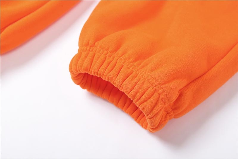 Solid color casual tracksuit pants from The Clothing Company Sydney, featuring a comfortable fit and versatile style.