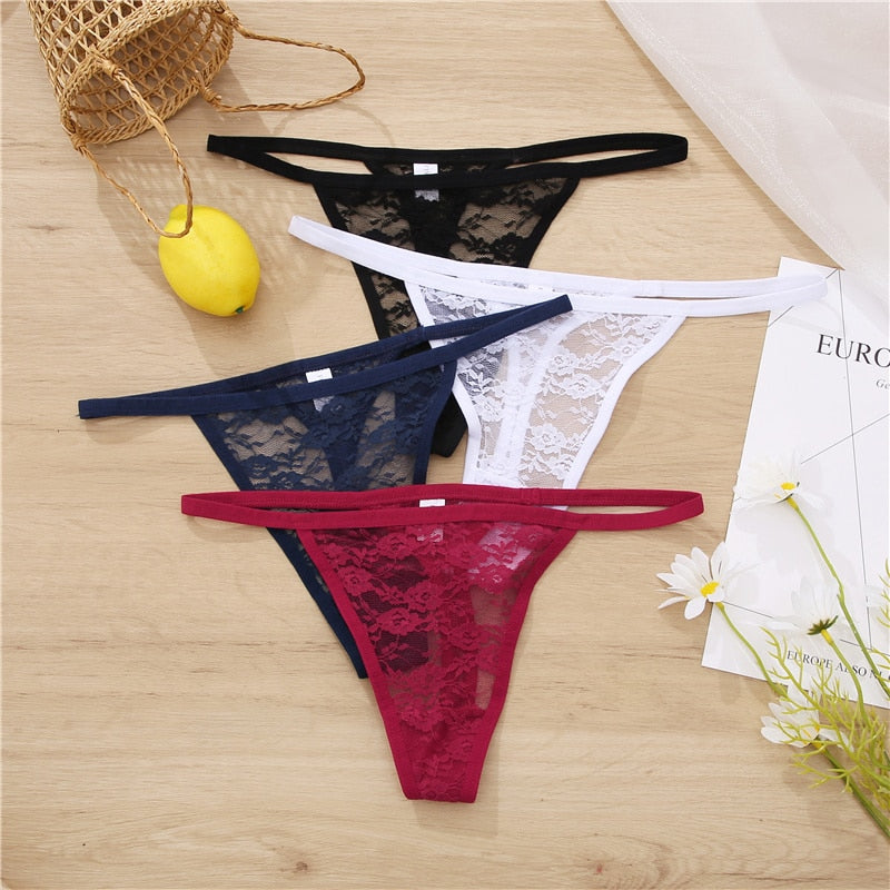 Two pairs of women’s lace thong panties with floral G-string design from The Clothing Company Sydney, showing delicate lace details.