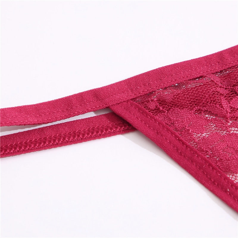 Two women's lace thong panties with floral G-string design from The Clothing Company Sydney, showcasing delicate lace and vibrant patterns.