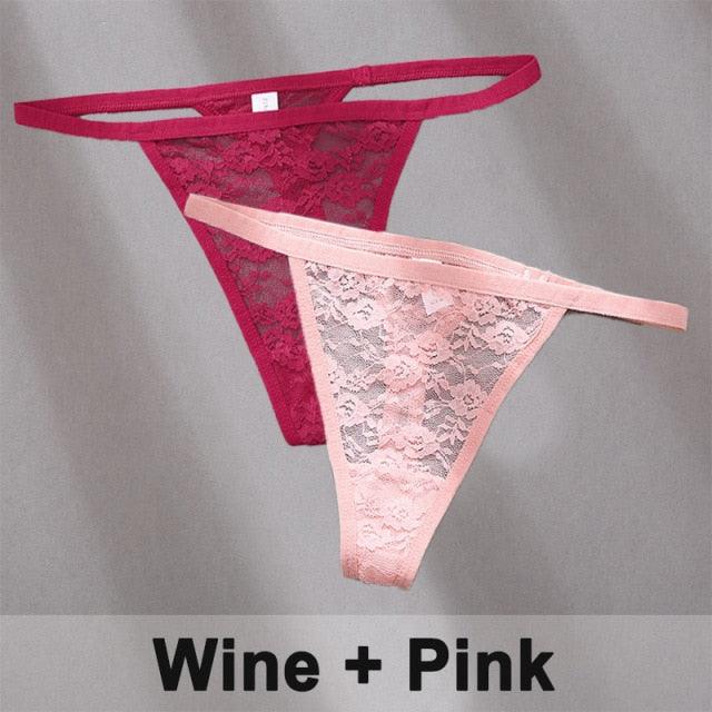 Two women’s floral lace thong panties from The Clothing Company Sydney, showcasing pink and black G-string lingerie set.
