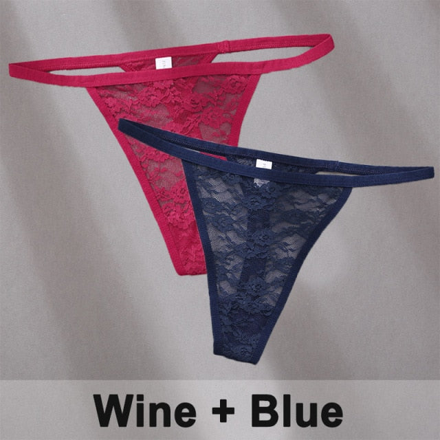 Two women's lace thong panties by The Clothing Company Sydney featuring floral G-string design and delicate lingerie underwear.