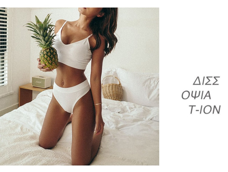 Two-piece seamless bra and thong set by The Clothing Company Sydney featuring low waist, wire-free bralette and cotton underwear.