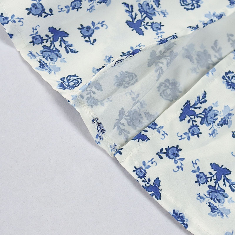 Floral print elegant short sleeve split dress by The Clothing Company Sydney, showcasing a stylish, flowy design.