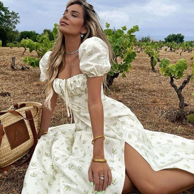 Elegant floral print short sleeve split dress by The Clothing Company Sydney, showcasing a stylish and flowy design.