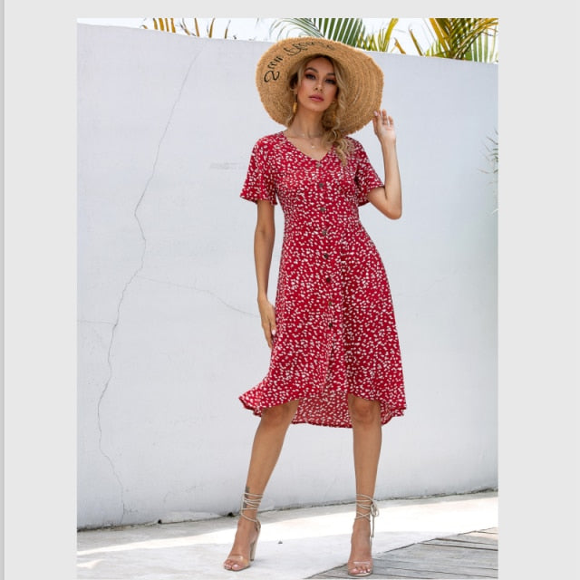 Summer midi V-neck dress by The Clothing Company Sydney featuring printed design, single row buttons, high waist, and irregular hem.