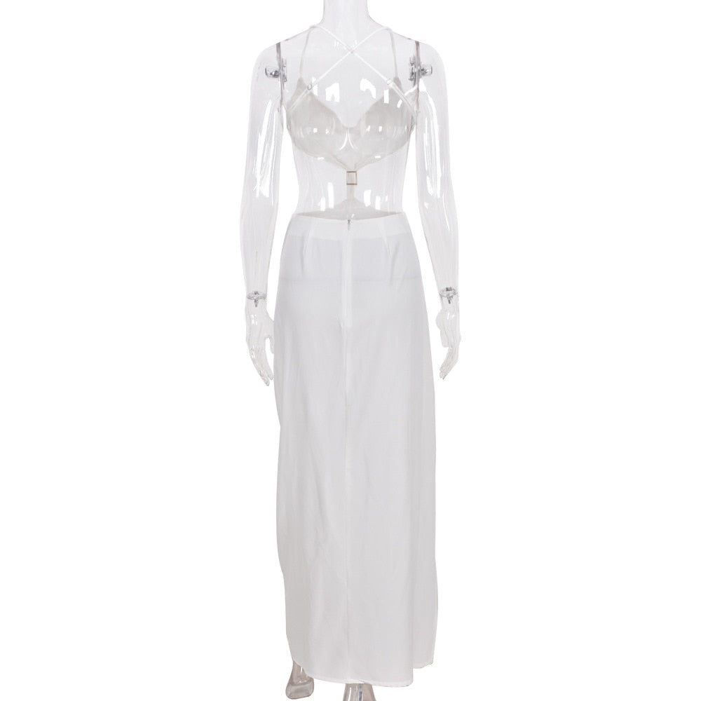 Backless split maxi dress by The Clothing Company Sydney featuring cut-out details, sleeveless design, perfect for summer evenings and parties.