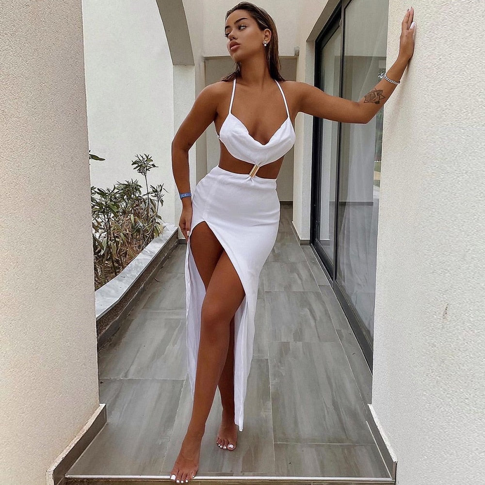 Backless split maxi dress by The Clothing Company Sydney featuring cut-out details, sleeveless design, perfect for summer evening parties.
