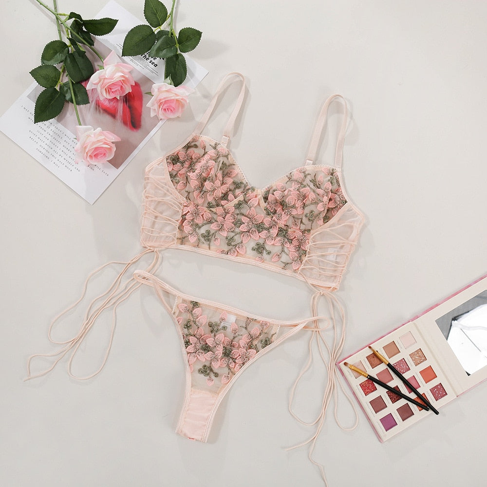 Pink floral embroidery lingerie set with thin cup bralette, push-up bra, and matching transparent lace panties by The Clothing Company Sydney.