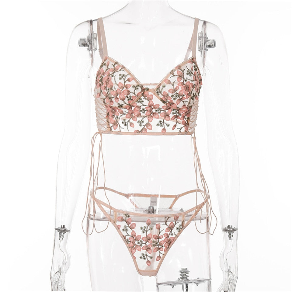 Pink floral embroidery bralette and panty set with thin cups, French lace, and transparent design from The Clothing Company Sydney.