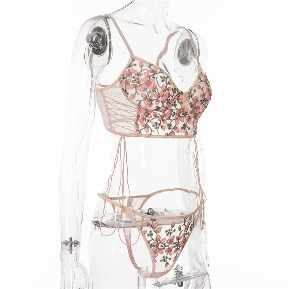 Pink floral embroidery lingerie set with thin cup bralette, push-up bra, and matching transparent panties from The Clothing Company Sydney.