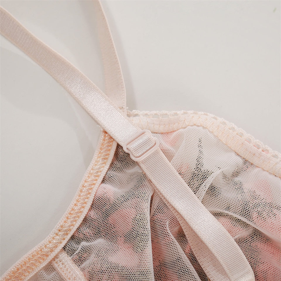 Pink floral embroidery lingerie set with thin cup bralette, push-up bra, transparent lace bra and matching panties from The Clothing Company Sydney.