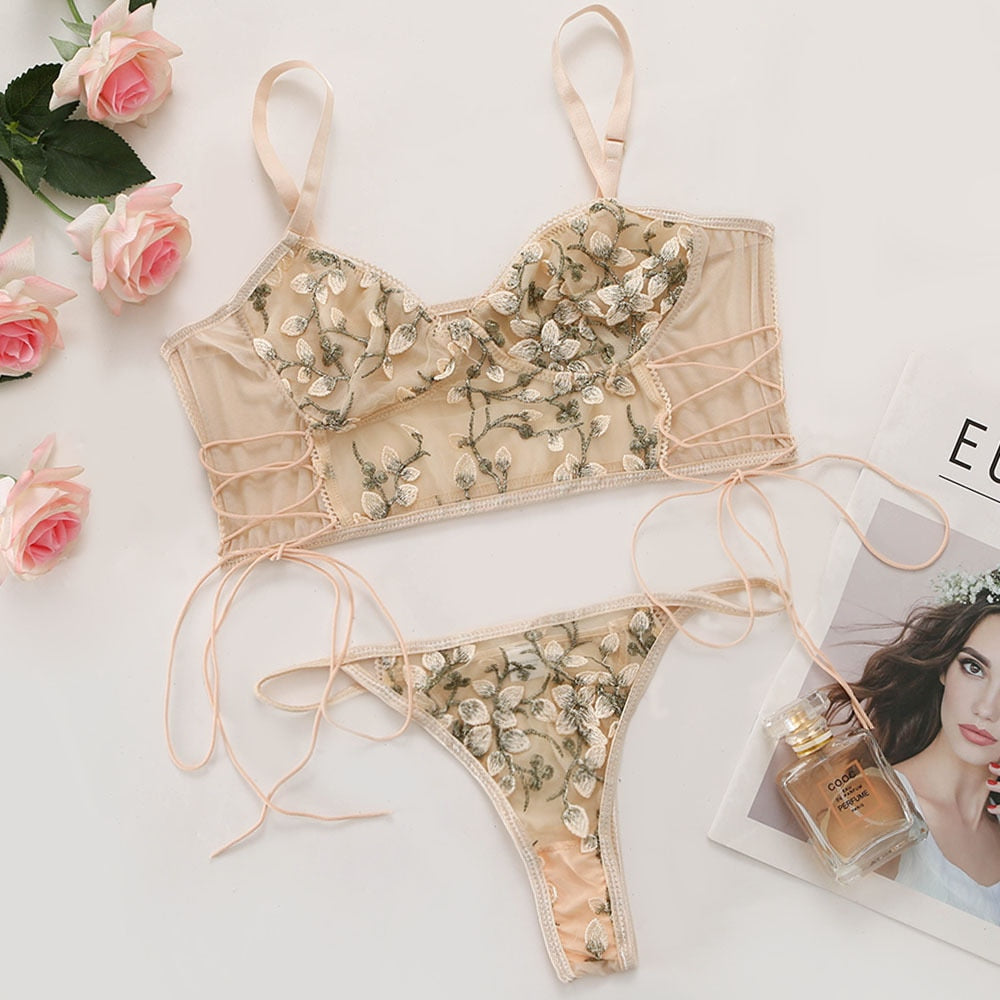 Pink floral embroidery lingerie set featuring a thin cup bralette and matching panties with French lace and transparent details.